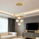 Pendente Lustre LED Círculos de Cristal e 4 Globos Dourados - Iluminação de Luxo para Ambientes Premium